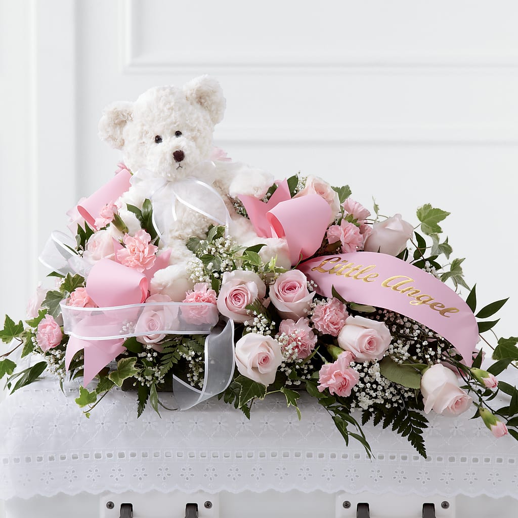 Touch of Sympathy Casket Spray – Heartfield Florist, Huntsville TX