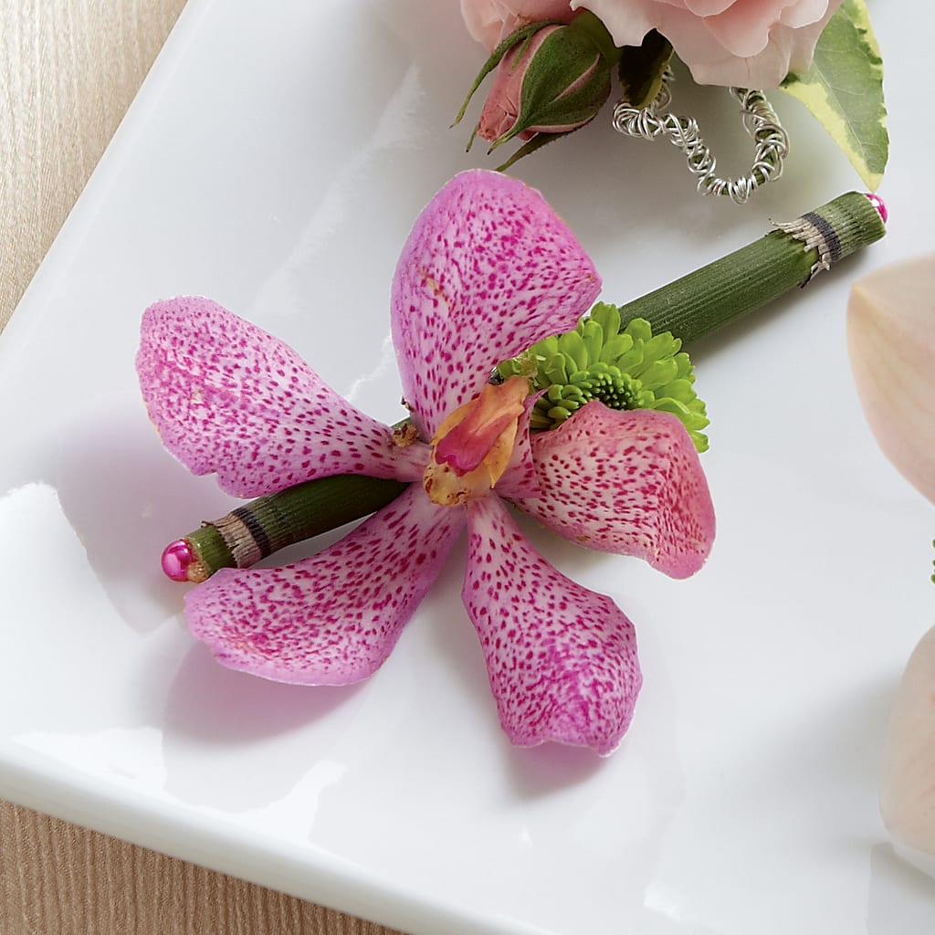 Pink Mokara Boutonniere – Heartfield Florist, Huntsville TX